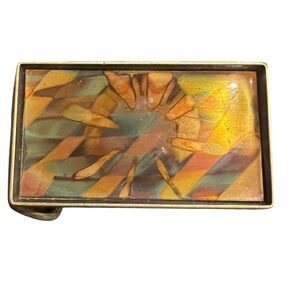 vintage solid brass BTS belt buckle featuring a striking abstract design